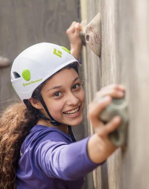 Girl on Rock Wall